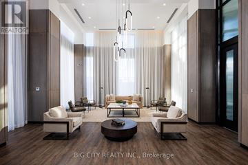 Toronto (Thorncliffe Park) condo for rent - A modern living room with a large sofa set and a coffee table.