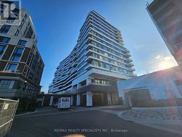Mississauga (Central Erin Mills) condo for rent - A tall building with a FedEx truck in front of it.