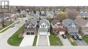 London North (North I) apartment for rent - A neighborhood with houses and cars parked in front.