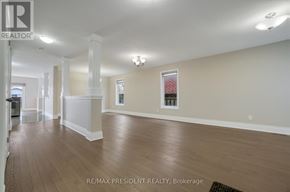 London North (North I) apartment for rent - A spacious room with wooden floors and white walls.