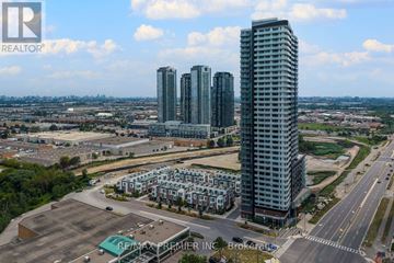 Vaughan (Concord) condo for rent - A real estate company logo is displayed on a building in a cityscape.