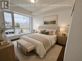 Toronto (Englemount-Lawrence) townhouse for rent - A bedroom with a large bed and a window overlooking a residential area.