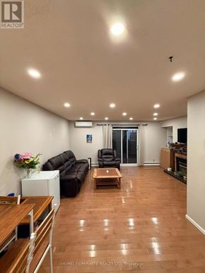Kingston (Central City East) townhouse for rent - A living room with a wooden floor and a white ceiling.
