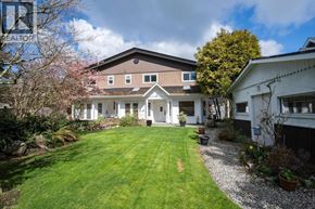 Delta apartment for rent - A house with a well-kept lawn in front of it.