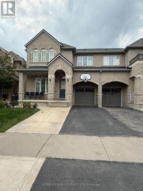 Brampton (Bram East) apartment for rent - A brick house with a basketball hoop on the front.