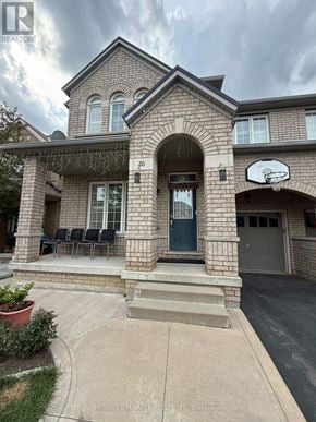 Brampton (Bram East) apartment for rent - A brick house with a basketball hoop on the side.