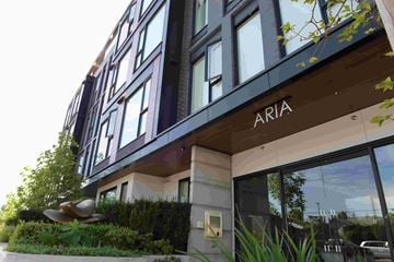 Vancouver apartment for rent - A modern building with the name ARIA on the front.