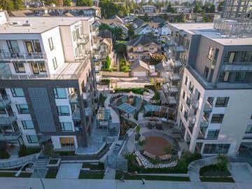 Coquitlam apartment for rent - A modern residential area with apartment buildings and a central courtyard.