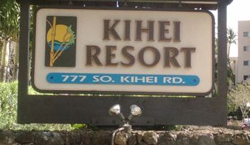 Kihei apartment for rent - A sign for Kihei Resort with a palm tree logo.