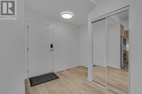 Mississauga (Hurontario) condo for rent - A white door with a black mat in front of it.