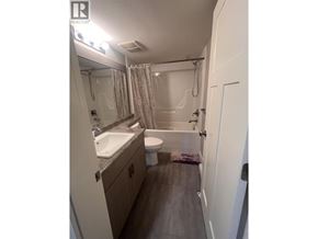 Coquitlam apartment for rent - A bathroom with a sink, toilet and bathtub.