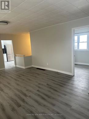 Aurora apartment for rent - A room with a grey floor and white walls.