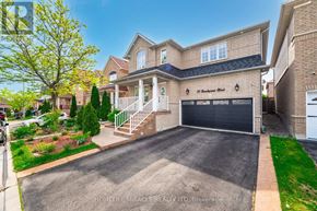 Brampton (Fletcher's Meadow) apartment for rent - A residential house with a garage and a driveway.