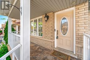 Brampton (Fletcher's Meadow) apartment for rent - A white door with a glass window is on a brick house.