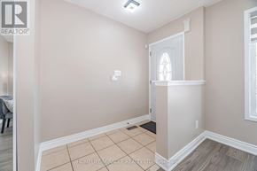 Brampton (Fletcher's Meadow) apartment for rent - A room with a window and a shelf.