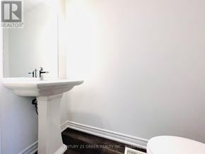 Hamilton (Parkview) townhouse for rent - A white sink in a bathroom with a white wall.
