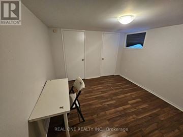 Hamilton (Ainslie Wood) apartment for rent - A room with a desk and chair in it.