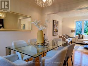 Toronto (Don Valley Village) apartment for rent - A dining room with a glass table and chairs.