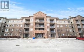 Brampton (Goreway Drive Corridor) condo for rent - A large apartment complex with a clear blue sky above.
