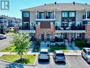 Ottawa townhouse for rent - A building with the text "REALTOR" on the top left corner.