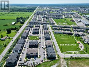 Ottawa townhouse for rent - An aerial view of a residential area with Bob Mills Park and 411 Pilot.