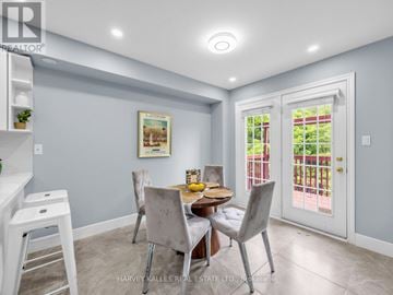 Pickering (Amberlea) apartment for rent - A dining room with a table set for four.