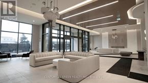 Vaughan (Vellore Village) condo for rent - A spacious living room with a large window and a view of a snowy landscape.