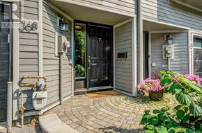Ottawa townhouse for rent - A house numbered 368 with a black door and a grey siding.