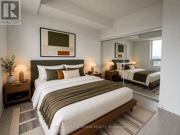 Toronto (Humber Heights) condo for rent - A bedroom with a large bed and a mirror on the wall.