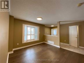 Richmond Hill (Oak Ridges) apartment for rent - A room with brown walls and a window with white blinds.