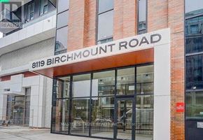 Markham (Unionville) condo for rent - The building on Birchmount Road has a glass door.