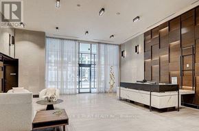 Markham (Unionville) condo for rent - A reception area with a desk and a chair.