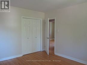 Newmarket (Central Newmarket) apartment for rent - A room with a white door and a white wall.