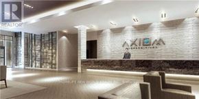 Toronto (Moss Park) condo for rent - A realtor's office with a reception desk and a person standing behind it.