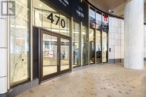 Toronto (Waterfront Communities) condo for rent - The image shows the front of a Royal LePage Vision Realty Brokerage office with the number 470 prominently displayed.