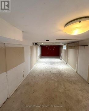 Oshawa (Central) apartment for rent - A room with a red door and a light fixture on the ceiling.