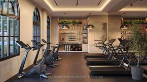 Toronto (Kingsway South) condo for rent - A gym with treadmills and a row of exercise bikes.