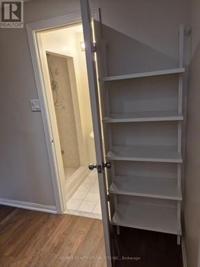 Vaughan (Brownridge) apartment for rent - A white door is open to a bathroom.