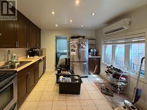 Toronto (Trinity-Bellwoods) apartment for rent - A kitchen with a refrigerator, sink, and oven.