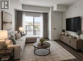 Milton (Co Coates) condo for rent - A well-lit living room with a grey sofa, a coffee table, and a flat-screen TV mounted on the wall.