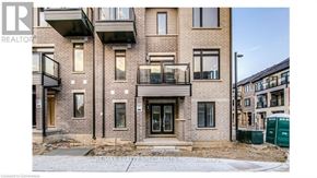 Brantford townhouse for rent - A building with the sign RE/MAX REALTY SPECIALISTS INC. PROPERTIES.