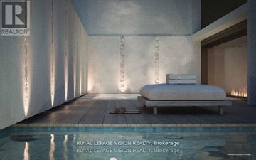 Toronto (Annex) condo for rent - A modern bedroom with a bed and a pool at the bottom.