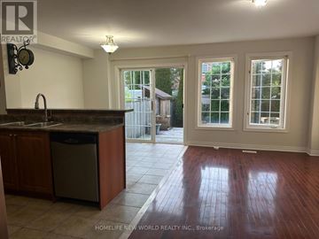 Whitby (Taunton North) townhouse for rent - A kitchen with a dishwasher and a sink.