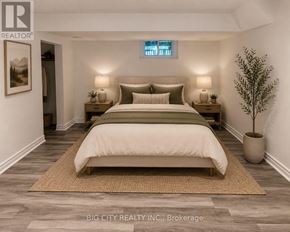 Richmond Hill (Mill Pond) apartment for rent - A bedroom with a large bed and a potted plant.
