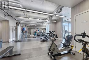 Toronto (Niagara) condo for rent - A gym with treadmills, weights, and other exercise equipment.