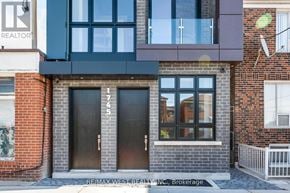 Toronto (Keelesdale-Eglinton West) multi-family for rent - A building with a sign that says REALTOR on the left side.