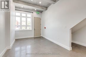 Toronto (Keelesdale-Eglinton West) multi-family for rent - A room with a window and a door is shown.