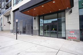 Mississauga (City Centre) condo for rent - A building with a glass door and a sign that says 401.