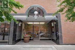 Toronto (Church-Yonge Corridor) condo for rent - The front of a building with a sign that says Saint James Place.