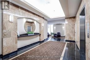 Toronto (Church-Yonge Corridor) condo for rent - A hallway with a planter box on the wall and a skylight above.